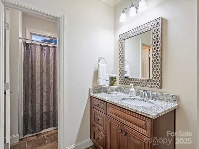 bathroom featuring a shower with curtain and vanity