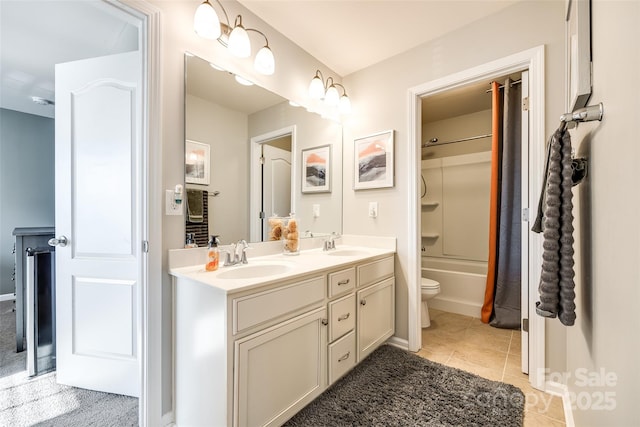 full bathroom with tile patterned flooring, vanity, shower / bath combination, and toilet