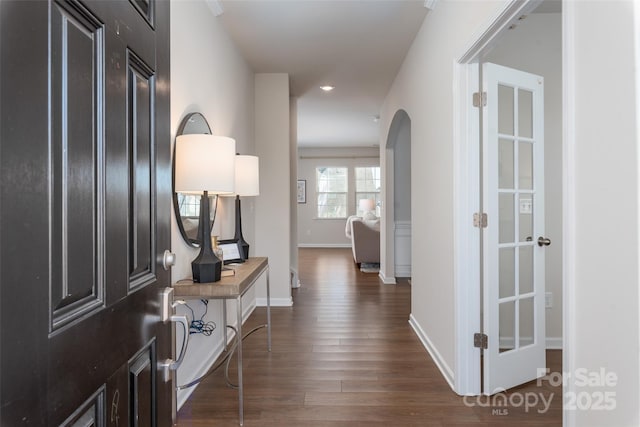 hallway featuring dark hardwood / wood-style flooring