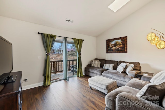 living room with lofted ceiling with skylight and dark wood-type flooring