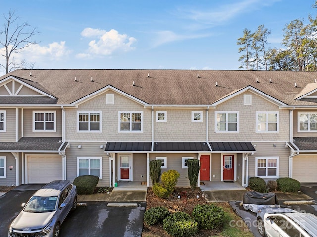 123 Foxden Dr Unit 202, Fletcher, NC 28732 - view of front facade featuring a shingled roof and driveway