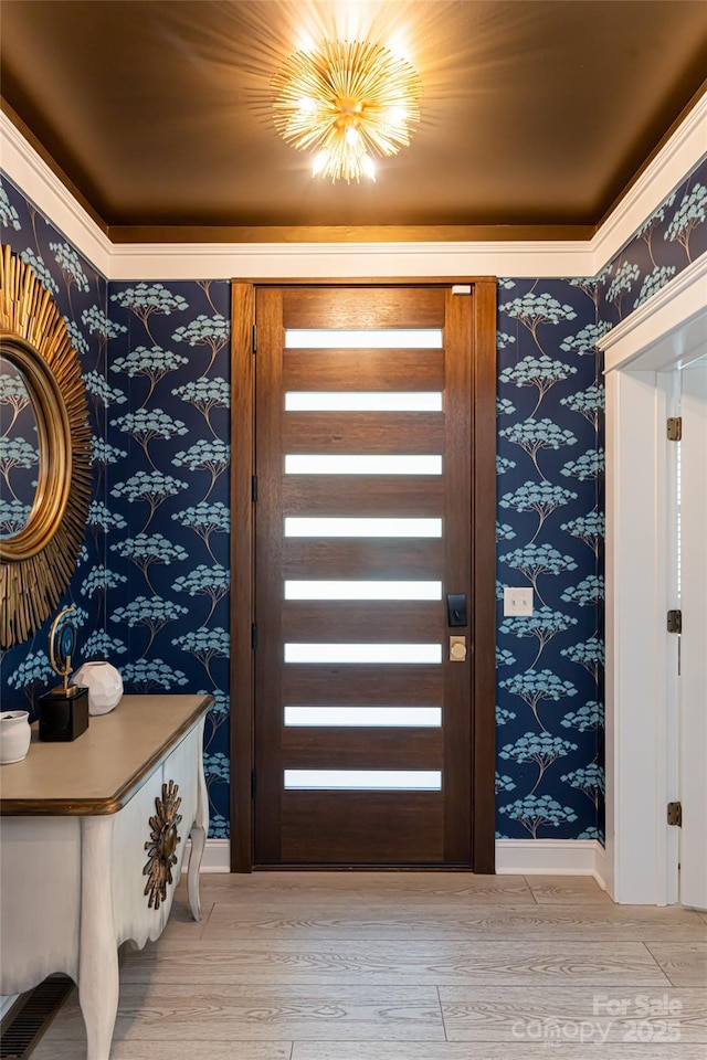 foyer with light wood-type flooring