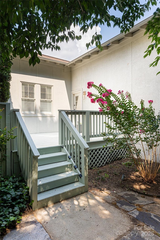 entrance to property with a deck