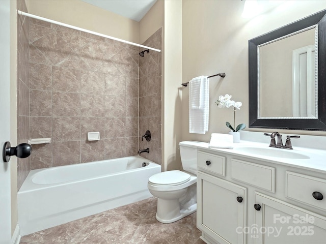 bathroom featuring shower / bathtub combination, vanity, and toilet