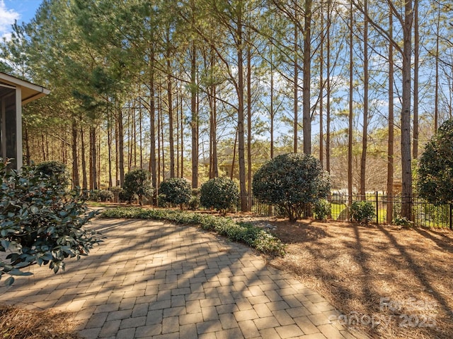 exterior space featuring a patio area and fence