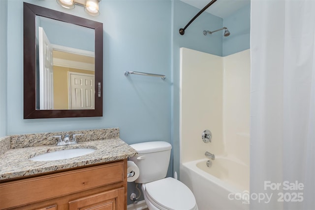 full bathroom featuring toilet, vanity, and shower / washtub combination