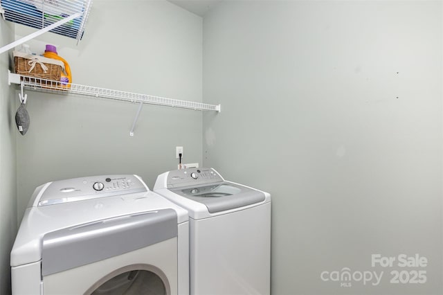 laundry room featuring washer and dryer