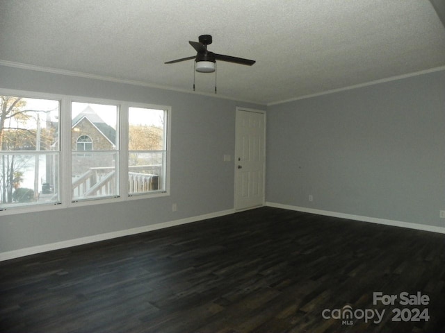 unfurnished room featuring a textured ceiling, crown molding, ceiling fan, and dark hardwood / wood-style floors