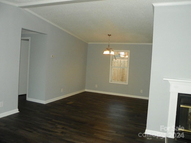 unfurnished living room featuring an inviting chandelier, ornamental molding, dark wood-type flooring, and vaulted ceiling