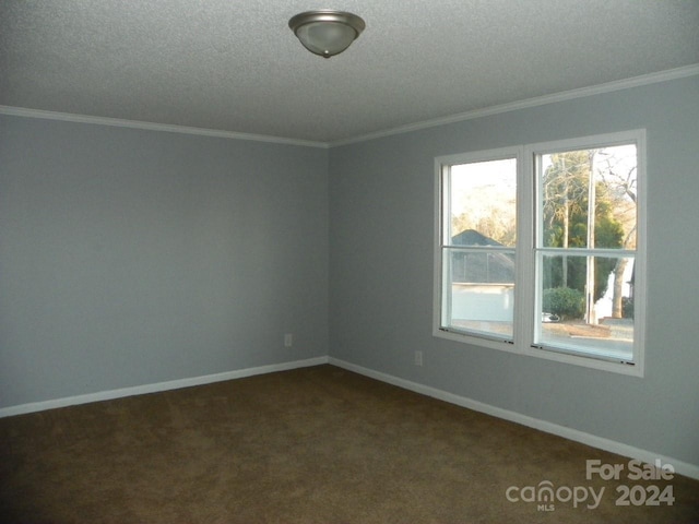 carpeted empty room with a textured ceiling and crown molding