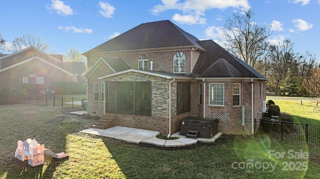 rear view of property featuring a yard