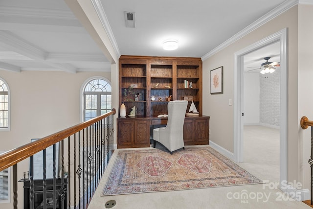 office with carpet flooring, beam ceiling, ceiling fan, coffered ceiling, and crown molding