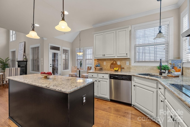 kitchen featuring white cabinetry, dishwasher, sink, tasteful backsplash, and pendant lighting