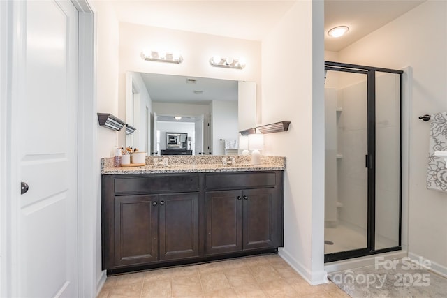 bathroom with vanity and walk in shower