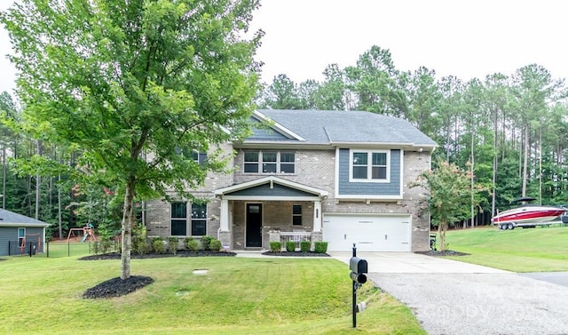 craftsman-style house featuring a front yard and a garage