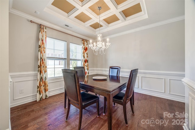 dining area with beamed ceiling, a chandelier, crown molding, and coffered ceiling