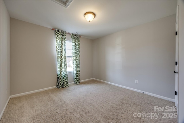 view of carpeted spare room