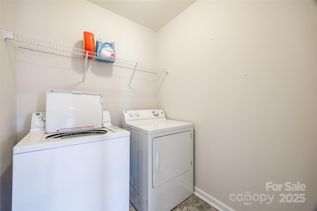 laundry area featuring separate washer and dryer