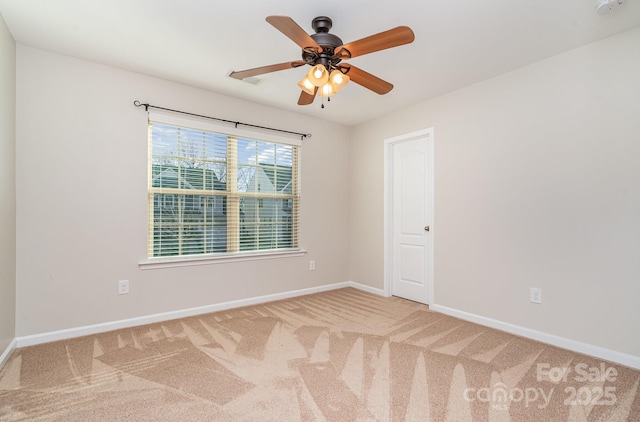 unfurnished room featuring carpet flooring and ceiling fan