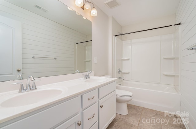 full bathroom with shower / tub combination, vanity, and toilet