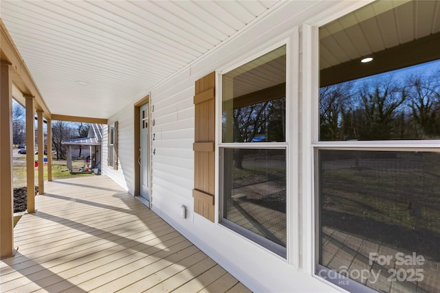 deck with covered porch