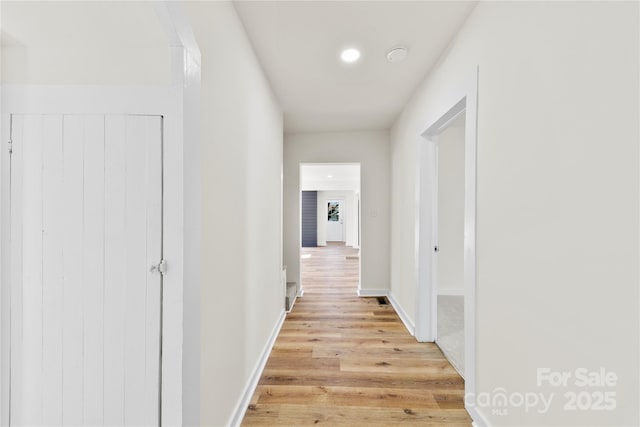 hall featuring light hardwood / wood-style floors