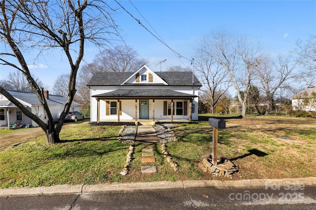 view of front of home featuring a porch and a front lawn