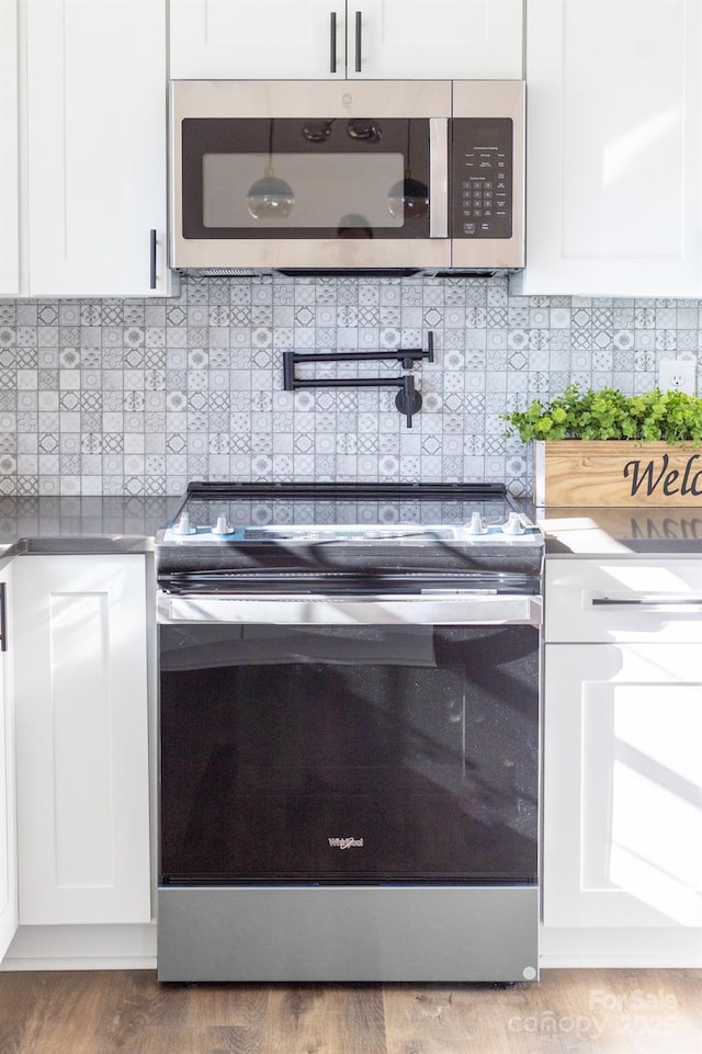 kitchen with white cabinets and stainless steel appliances