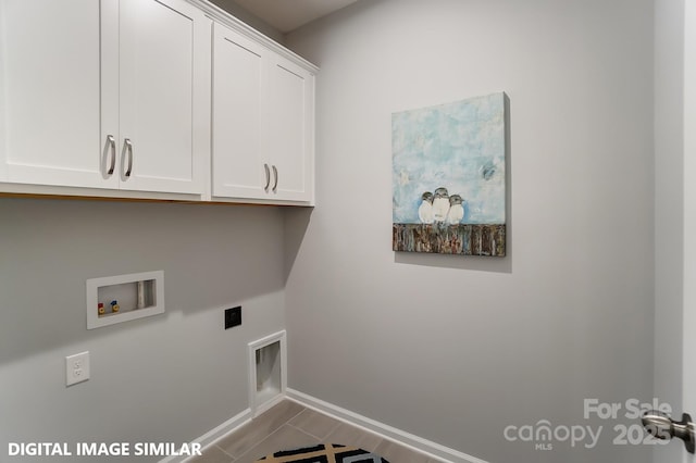 washroom featuring cabinets, hookup for a washing machine, tile patterned flooring, and hookup for an electric dryer