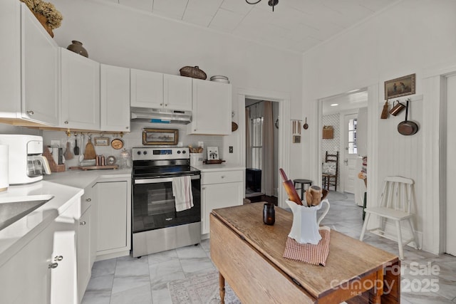 kitchen with white cabinetry and stainless steel electric range oven