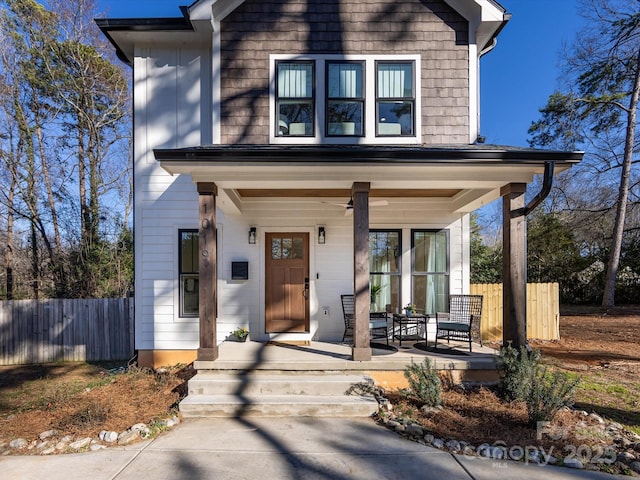 view of property featuring a porch