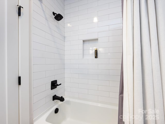 bathroom with shower / tub combo with curtain