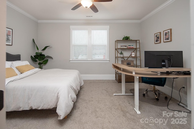 bedroom with ceiling fan, carpet floors, and crown molding