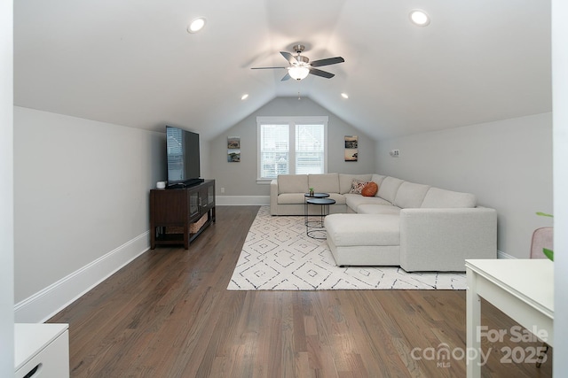 living room featuring hardwood / wood-style floors, ceiling fan, and lofted ceiling