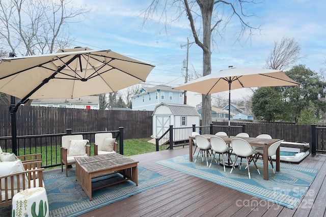 wooden deck with a shed