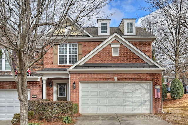 view of front of house with a garage