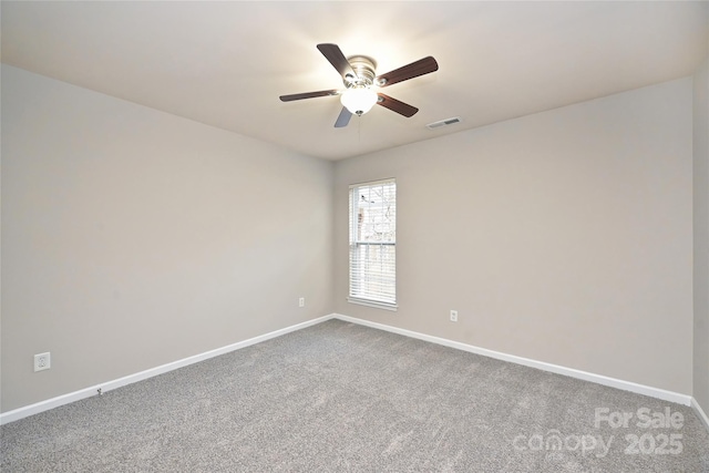 carpeted empty room with ceiling fan