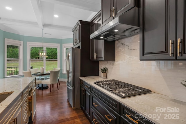 kitchen with light stone countertops, stainless steel appliances, tasteful backsplash, dark hardwood / wood-style flooring, and beamed ceiling