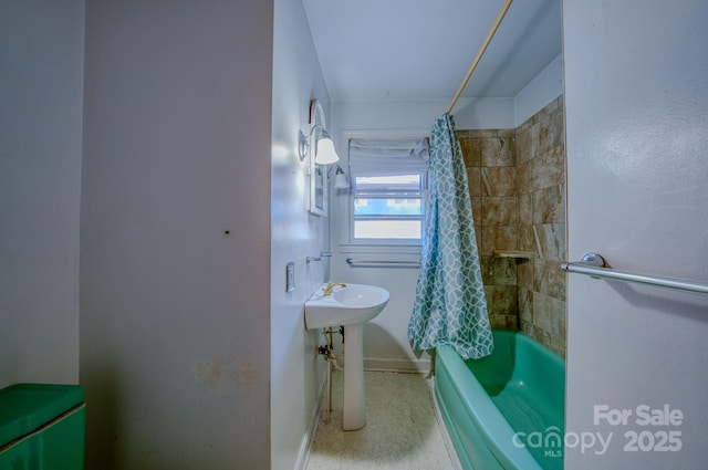 bathroom featuring shower / bath combination with curtain