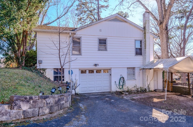 view of front of home featuring a garage