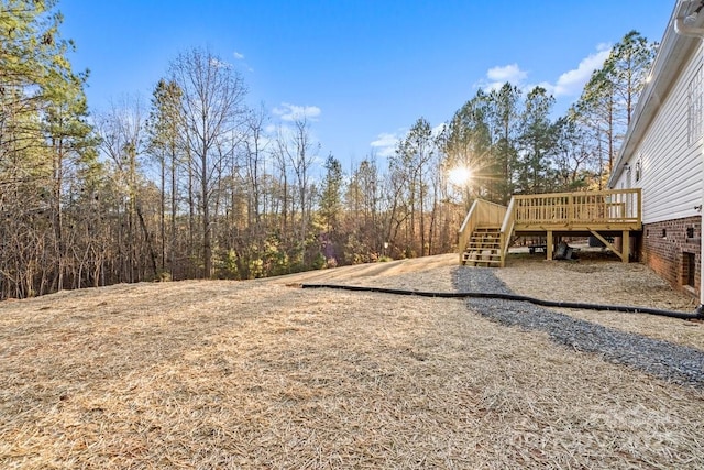 view of yard featuring a deck