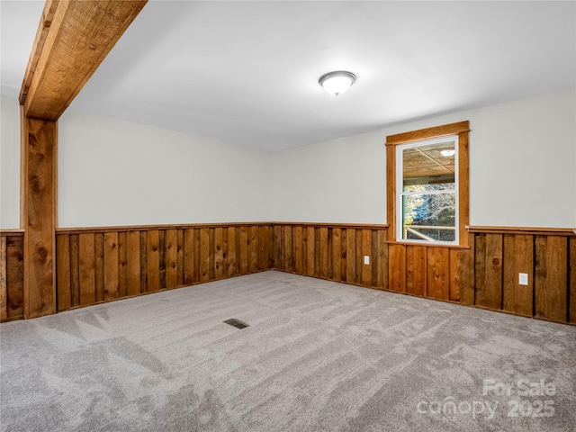 unfurnished room with carpet floors