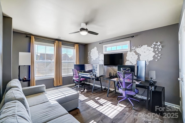 office space featuring ceiling fan and dark wood-type flooring