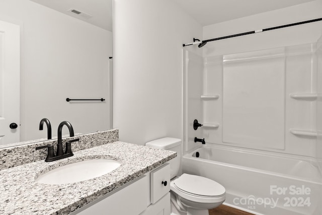 full bathroom with vanity, toilet, and bathing tub / shower combination