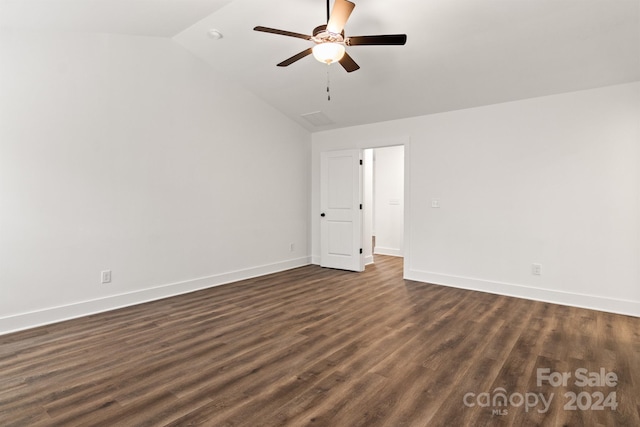 unfurnished room with ceiling fan, dark hardwood / wood-style floors, and lofted ceiling