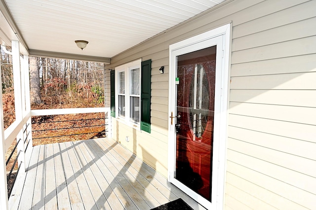 wooden terrace with covered porch