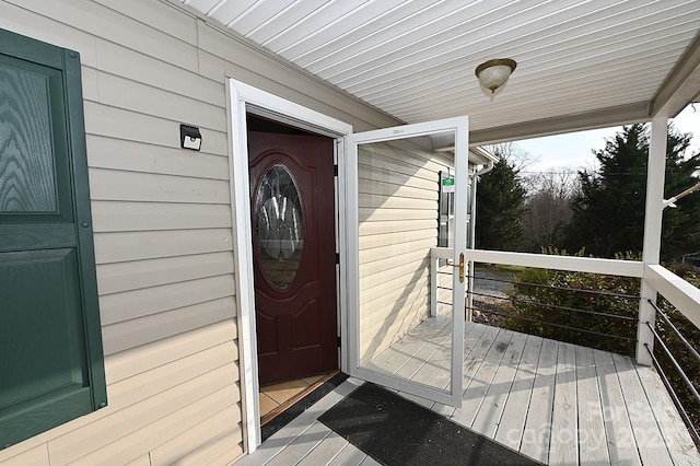 doorway to property featuring a porch