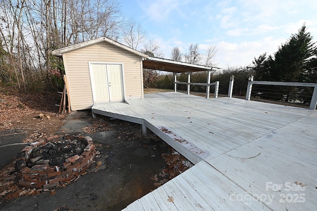 deck featuring a fire pit