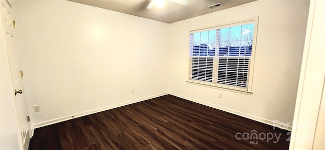 empty room with ceiling fan and wood-type flooring