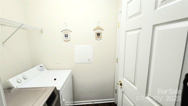 washroom with separate washer and dryer